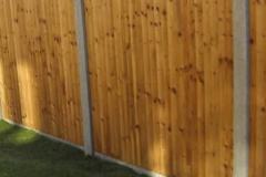 Closeboard panel on concrete